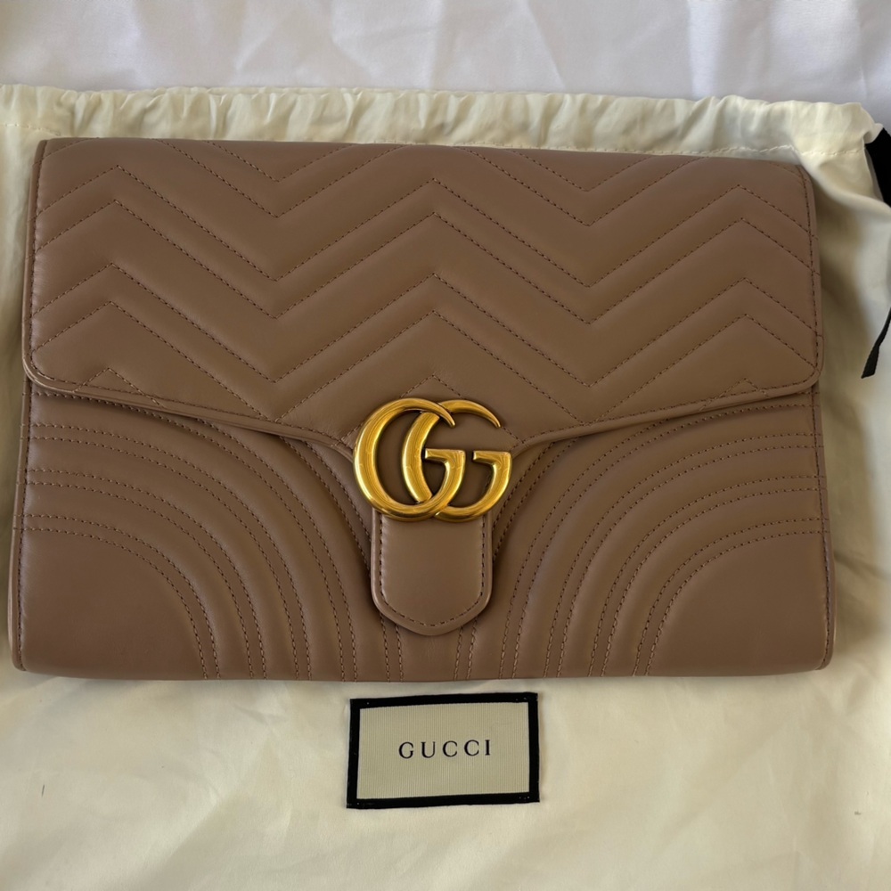 Gucci GG Marmont Matelassé Leather Clutch.